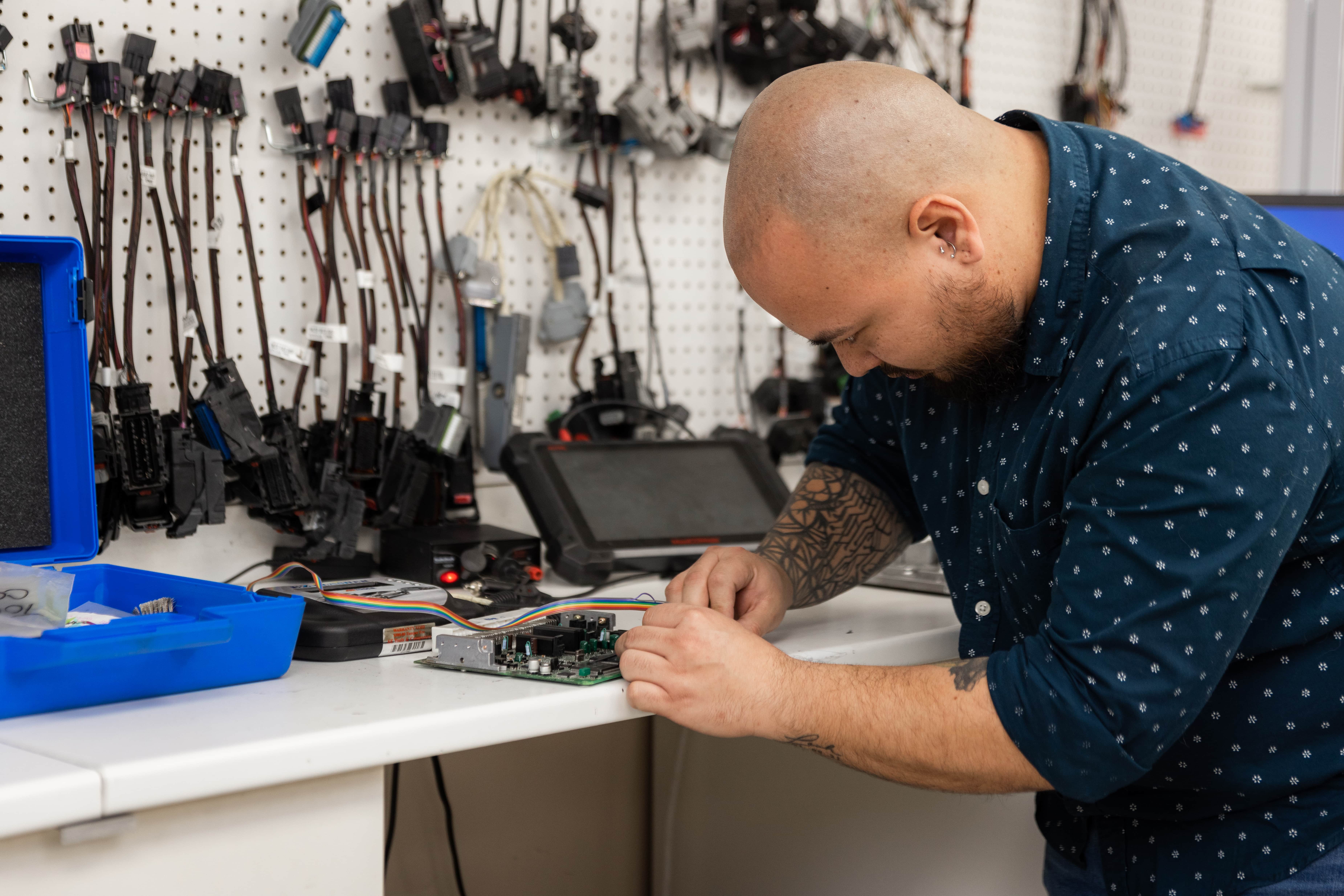 Programmer troubleshooting a computer