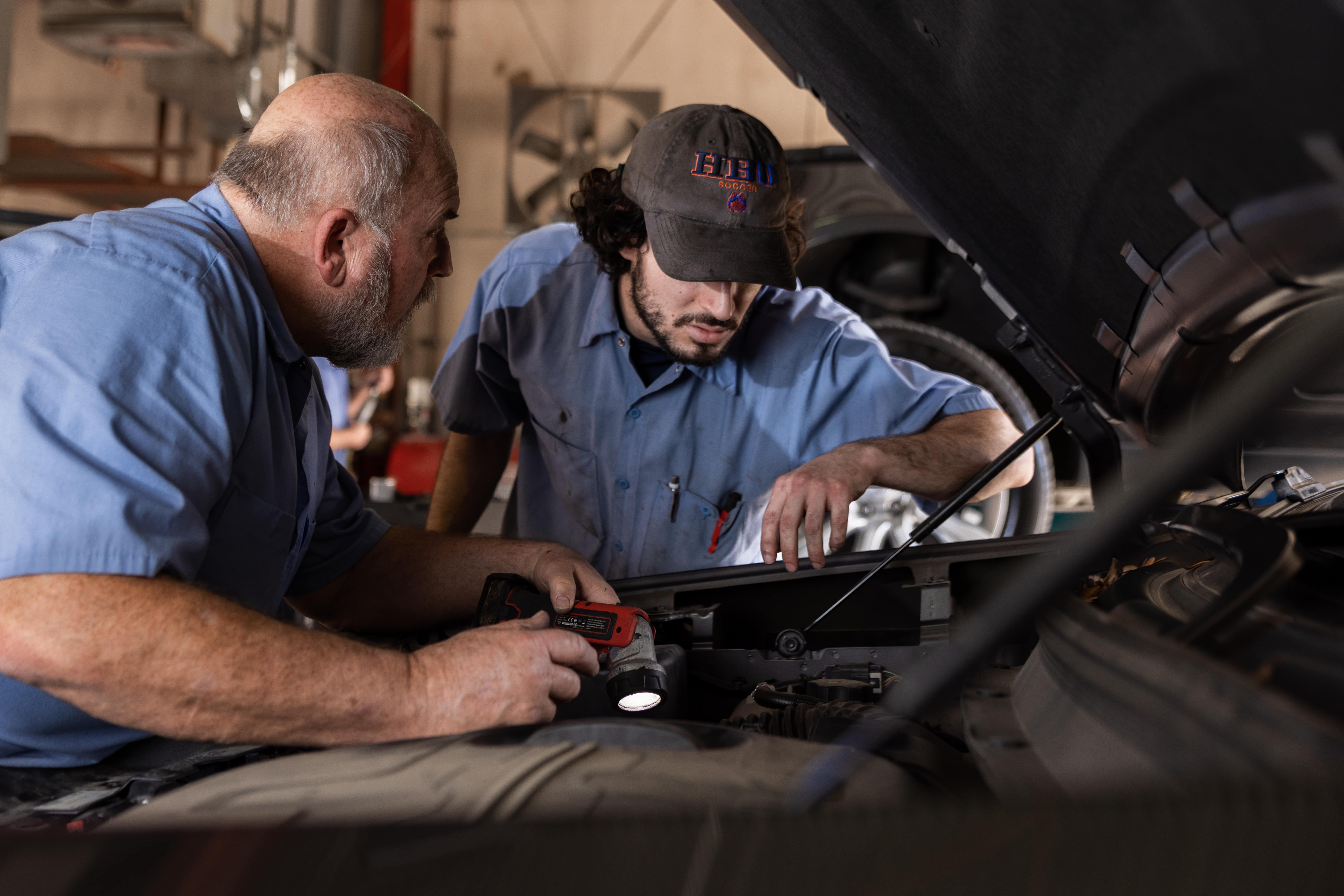 Mechanics working together for a diagnosis for electronic control modules