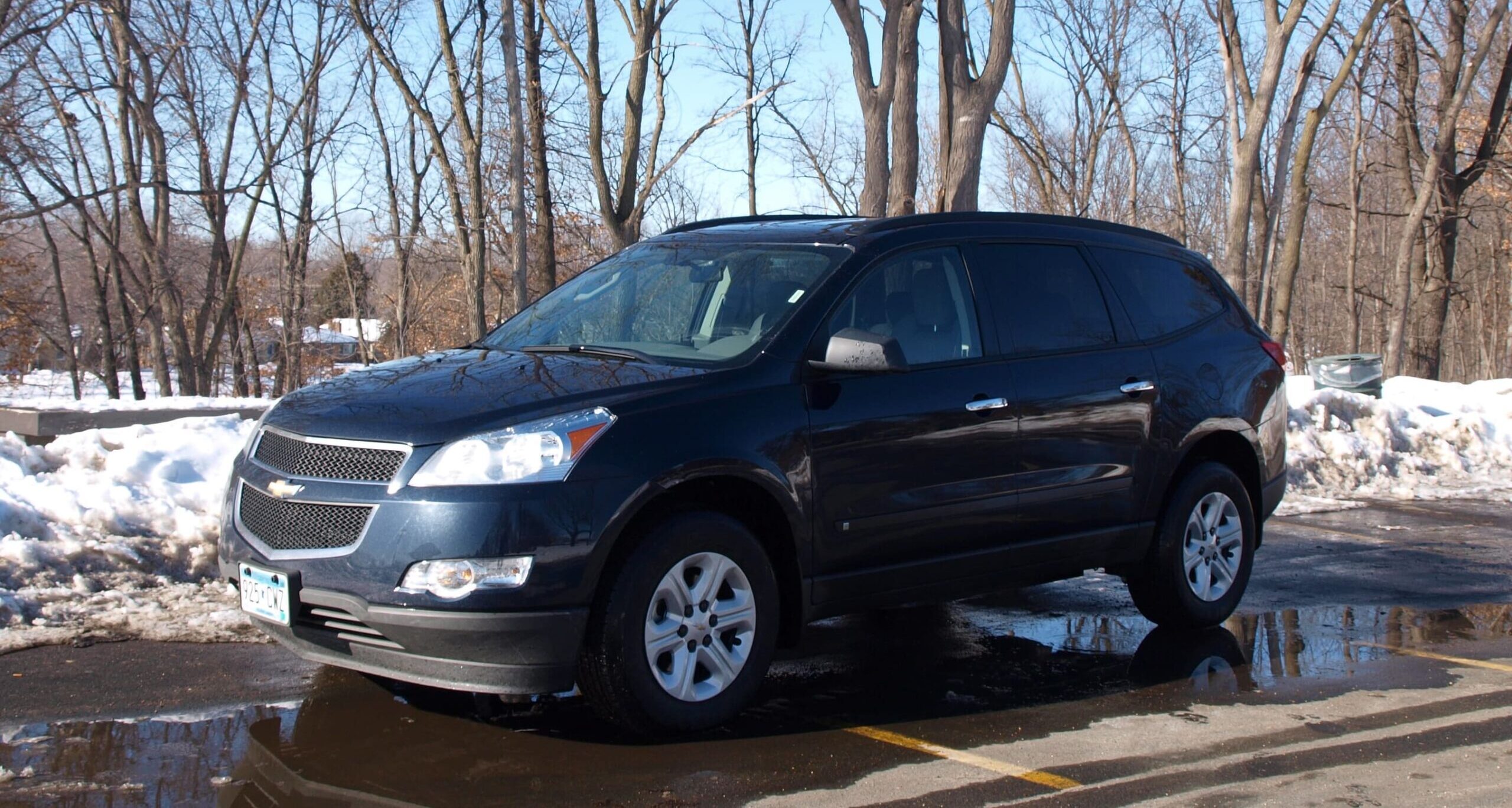 2010 Chevrolet Traverse with a winter background